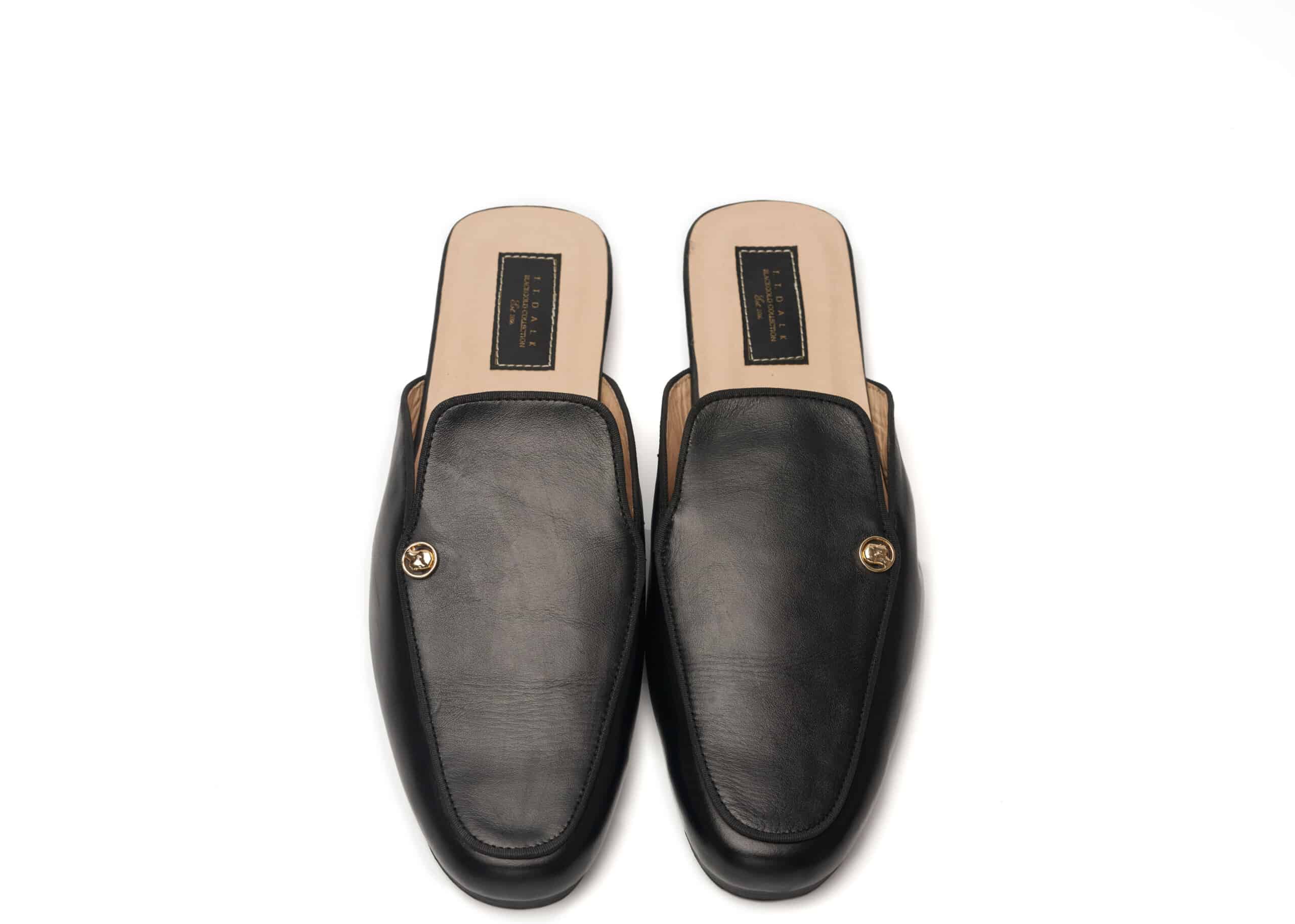 Black leather mules with silhouette logo - T.T.Dalk Nigeria